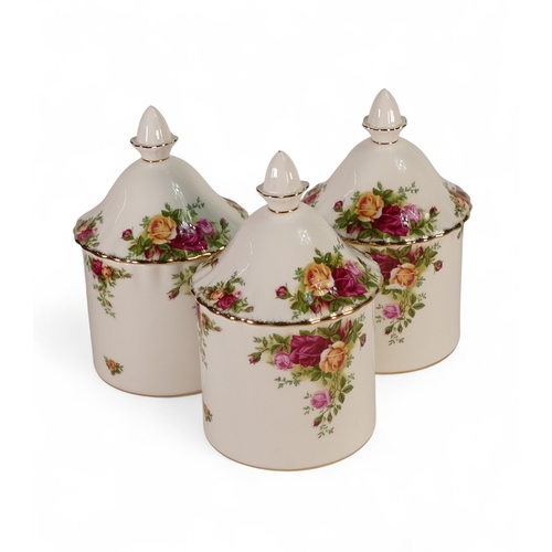 142 - Royal Albert 'Old Country Roses' set of three lidded storage jars. Height:- 20cm including lids (3)