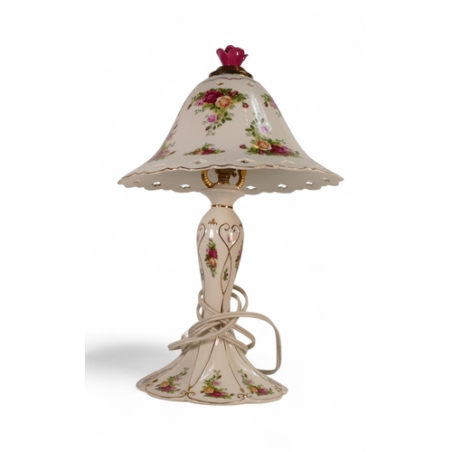 143 - Royal Albert 'Old Country Roses' design lamp base and shade topped with a red rose. H:-45cm (not tes... 