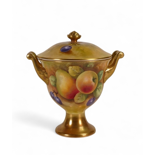 148 - Coalport Hand painted footed lidded Urn with decorative gilt handles depicting a Fruit design with a... 