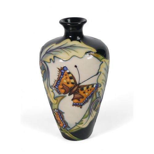 207 - Moorcroft small vase decorated in the Avalon design by Sian Leeper, dated 2006, h.11.5cm.