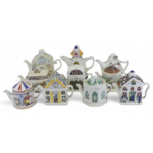 61 - Wade selection of Collectors novelty teapots to include:- The Police Station, The Wedding, Railway S... 