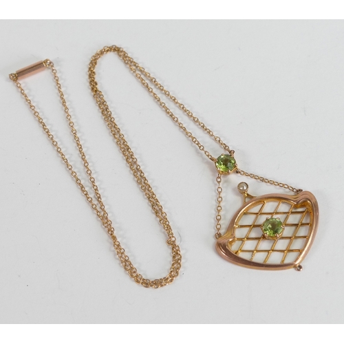 863 - 9ct rose gold pendant and chain, the pendant set with green stones 3.2g.