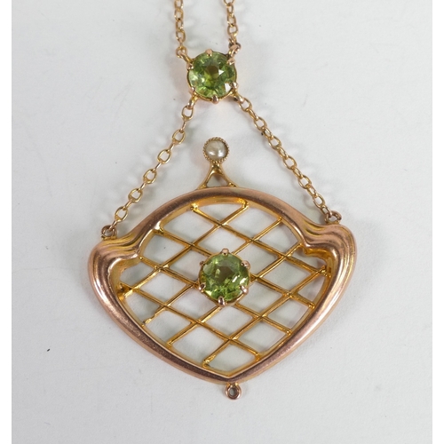 863 - 9ct rose gold pendant and chain, the pendant set with green stones 3.2g.
