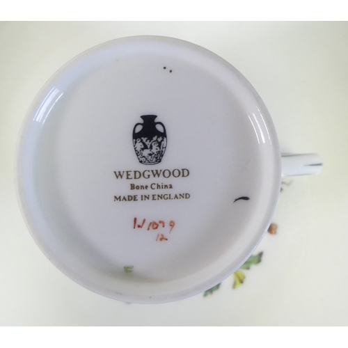 544 - An Extensive Wedgwood dark blue Florentine dinner, tea and coffee set, comprising large oval platter... 