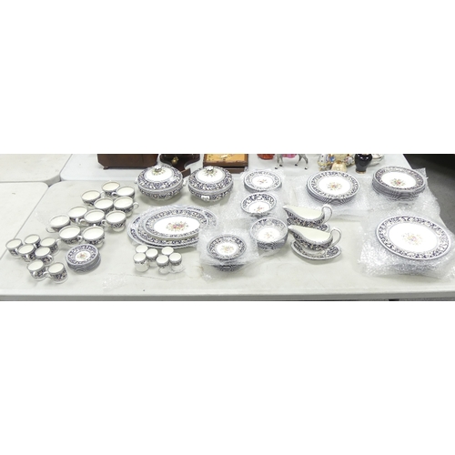 544 - An Extensive Wedgwood dark blue Florentine dinner, tea and coffee set, comprising large oval platter... 
