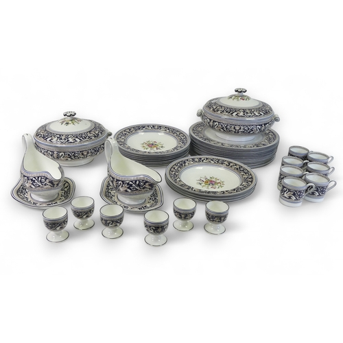 544 - An Extensive Wedgwood dark blue Florentine dinner, tea and coffee set, comprising large oval platter... 