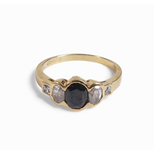 815 - 18ct gold sapphire and diamond ring, size O, 3.6g.