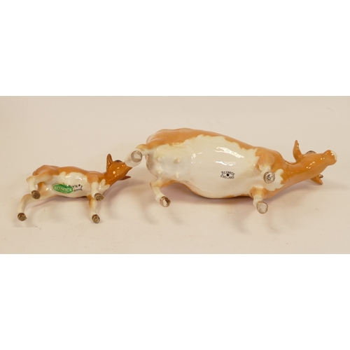 296 - Beswick, Guernsey cow 1248 and calf 1249A. (2)