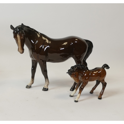 96 - Beswick mare facing left 976, together with foal head down, 1085, both in brown gloss. (2)