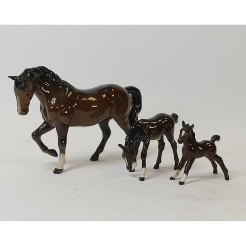 104 - Beswick stocky mare 855, together with head down foal 946 and foal 997. (3)