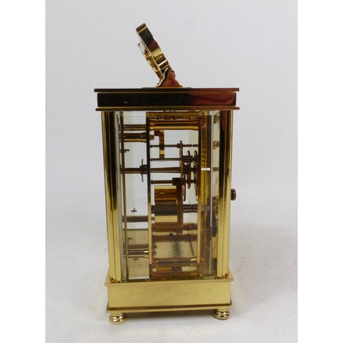 A David Peterson brass carriage clock, circa 1990, retailed by JJ ...