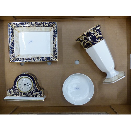 403 - Wedgwood Cornucopia pattern items to include a mantle clock, vase, rectangular dish, etc (1 tray).