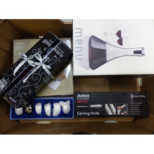 314 - A collection of boxed items: silver-plated napkin ring set, wine decanter, cheese board set, hand-pa... 