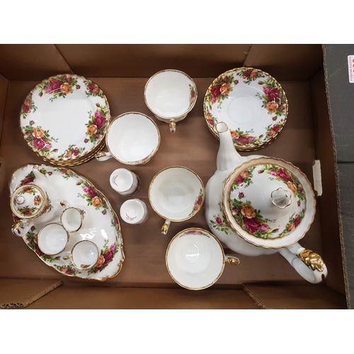 317 - Royal Albert tea and dinnerware in the Old Country Roses pattern, to include a large teapot, 4 tea c... 