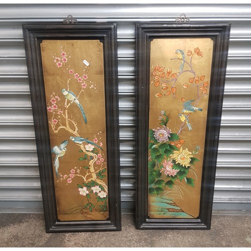 611 - Two large modern Chinese framed decorative panels, depicting birds and fauna on a gilt field, 92cm x... 
