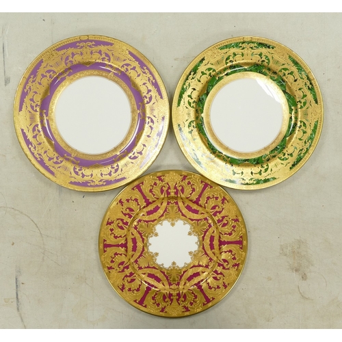 562 - De Lamerie Fine Bone China, a selection of heavily gilt plates in varied colourways & designs. Made ... 