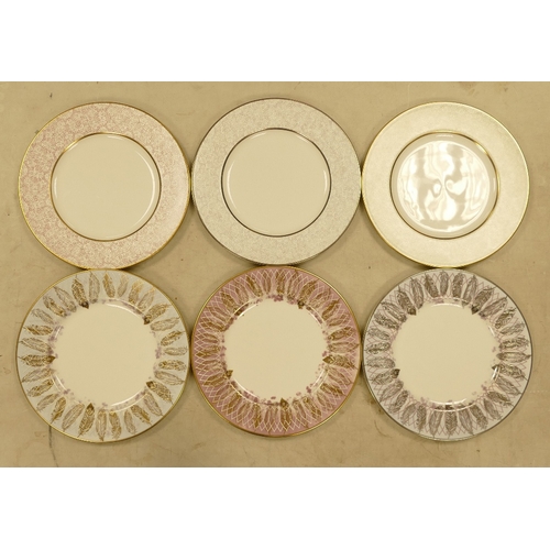 557 - De Lamerie Fine Bone China, a selection of heavily gilt plates in varied colourways & designs. Made ... 