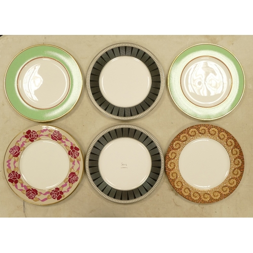 559 - De Lamerie Fine Bone China, a selection of heavily gilt plates in varied colourways & designs. Made ... 