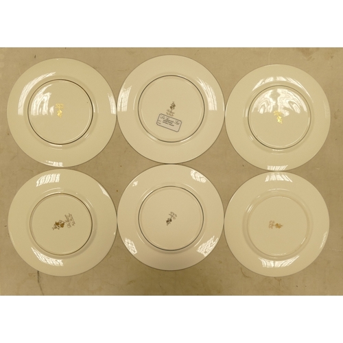 559 - De Lamerie Fine Bone China, a selection of heavily gilt plates in varied colourways & designs. Made ... 