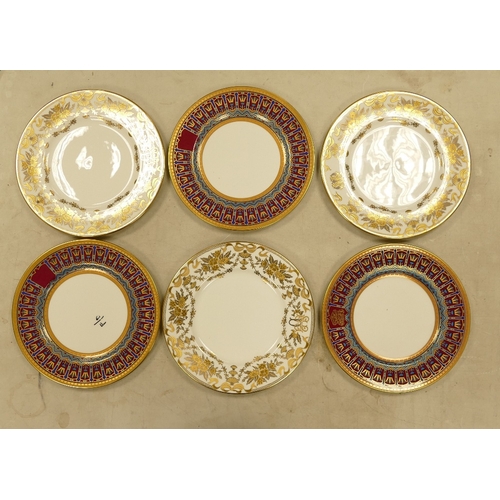 558 - De Lamerie Fine Bone China, a selection of heavily gilt plates in varied colourways & designs. Made ... 