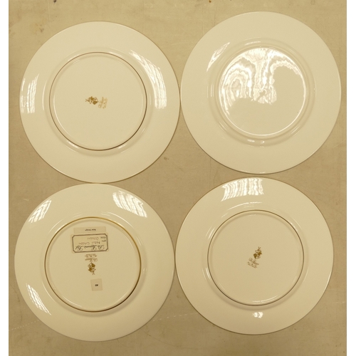 553 - De Lamerie Fine Bone China, a selection of heavily gilt plates in varied colourways & designs. Made ... 