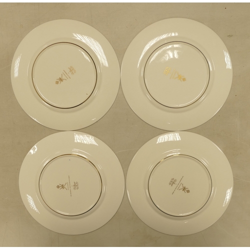 581 - De Lamerie Fine Bone China, a selection of heavily gilt plates in varied colourways & designs. Made ... 