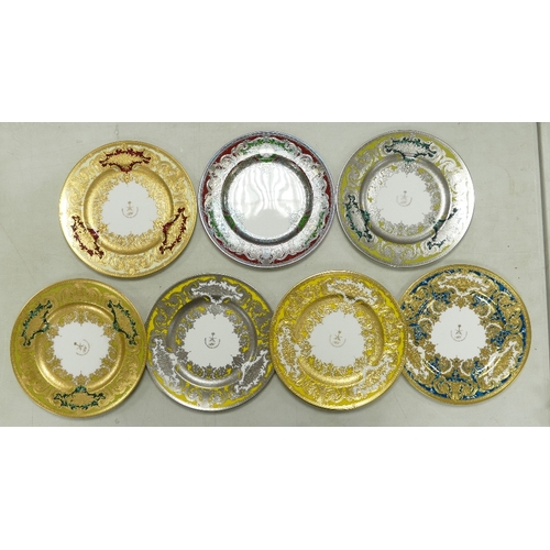 545 - De Lamerie Fine Bone China, a selection of heavily gilt plates in varied colourways & designs. Made ... 