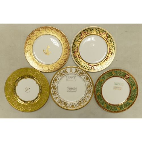 537 - De Lamerie Fine Bone China, a selection of heavily gilt plates in varied colourways & designs. Made ... 