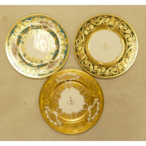 539 - De Lamerie Fine Bone China, a selection of heavily gilt plates in varied colourways & designs. Made ... 