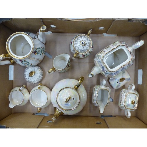 632 - Three Sadler three-piece tea services (1 tray).