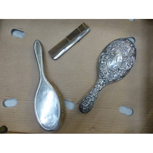 416 - Silver covered hair brush and hand mirror, and a comb with a silver covered spine, all hallmarked, n... 