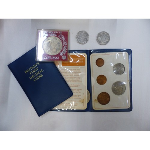 690 - Two 'Britain's First Decimal Coins' folder sets, together with 2 collectable 50 pence pieces and a S... 