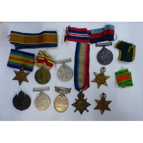 684 - Group of First and Second World War medals, to include three First World War medals awarded to Pte/L... 