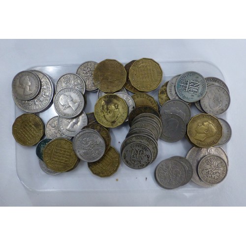 691 - A small collection of coins to include threepence pieces, sixpences, etc, some pre-1947 coins noted.