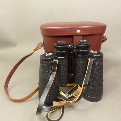 142 - Carl Zeiss Jena Jenoptem 10x50W binoculars with original leather case.