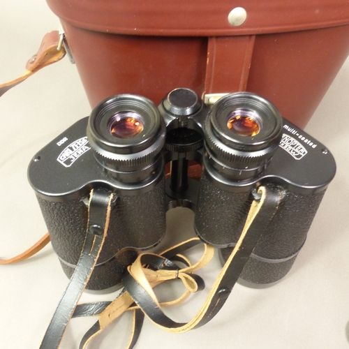 142 - Carl Zeiss Jena Jenoptem 10x50W binoculars with original leather case.