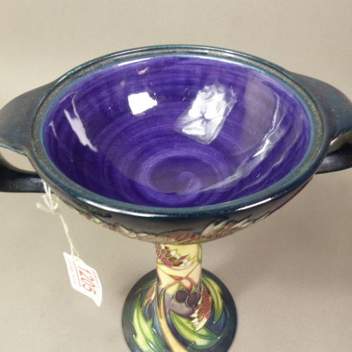 130 - Moorcroft Symphony pattern bonbonniere and cover, an MCC piece, dated 2004, height 21.5cm.