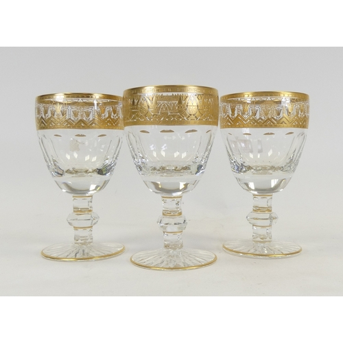 599 - De Lamerie Fine Bone China Glass Goblets, heavily gilded with various designs. Made in England. (3)