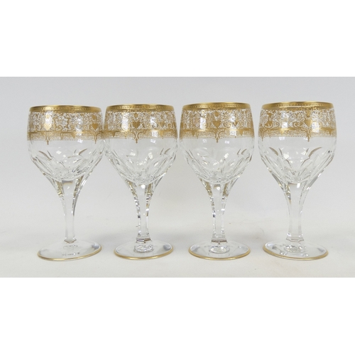 600 - De Lamerie Fine Bone China, 4 matching Wine Glasses with heavy gilt decoration.. Made in England. (4... 