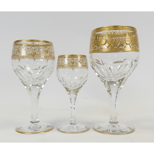 595 - De Lamerie, two heavily gilt decorated wine glasses and sherry glass. (3)