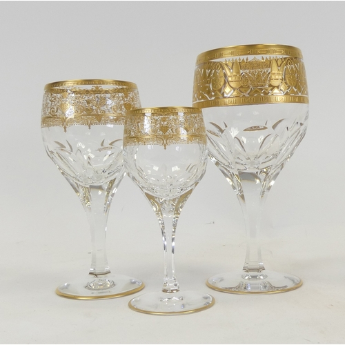 595 - De Lamerie, two heavily gilt decorated wine glasses and sherry glass. (3)