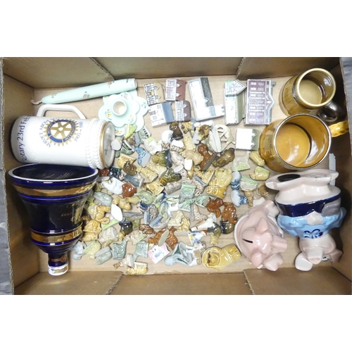 505 - A collection of Wade to include tankards, Natwest Piggy Bank, candle and holder, miniature cottages ... 