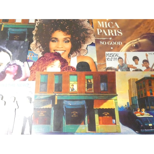 608 - A collection of music card board cut outs featuring Carpenters, Musical Youth, Diana Ross, Huey Lewi... 