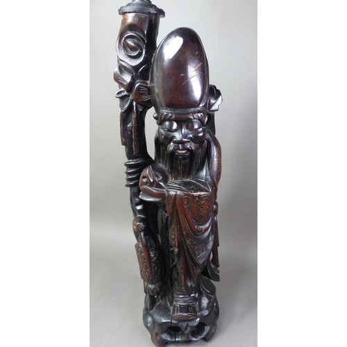 280 - Large carved hardwood Oriental figural table lamp, height of wood base 55cm (no wiring).