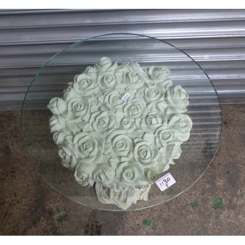 674 - Modern composite pedestal table with entwined rose decoration in a pale green finish and a floating ... 