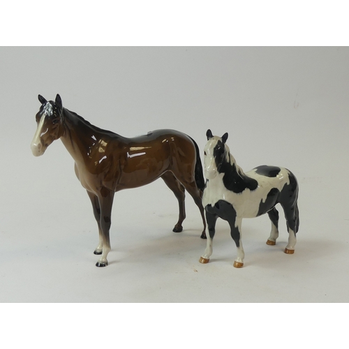 104 - Beswick Horses to include:- Race Horse model no:- 701 together with Pinto Piebald Pony. Tallest:-20c... 