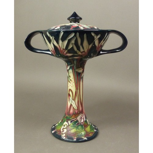 93 - Moorcroft bonbonniere and cover in the Minuet pattern, 2005, height 21.5cm.