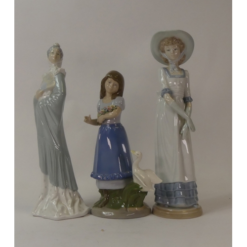 95 - Nao porcelain figurines, Lady with Shawl and fan, and Country Girl in Summer Hat, together with Nada... 