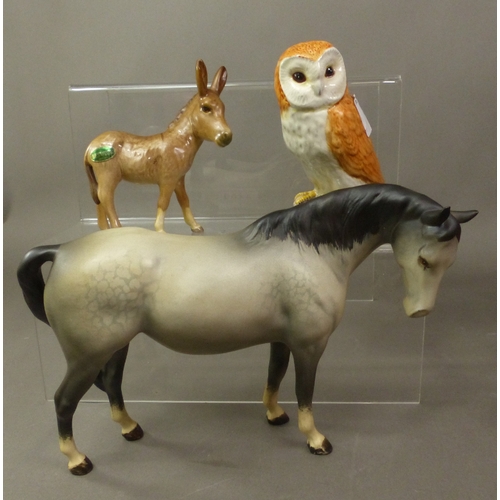 111 - Beswick matt grey 976 horse, together with a small Beswick Barn Own and a Beswick donkey foal (3).