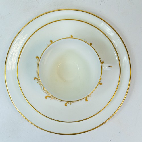 372 - Royal Doulton 'Rondo', gilt design on crisp white China, part tea/dinner set to include:- tea pot, e... 